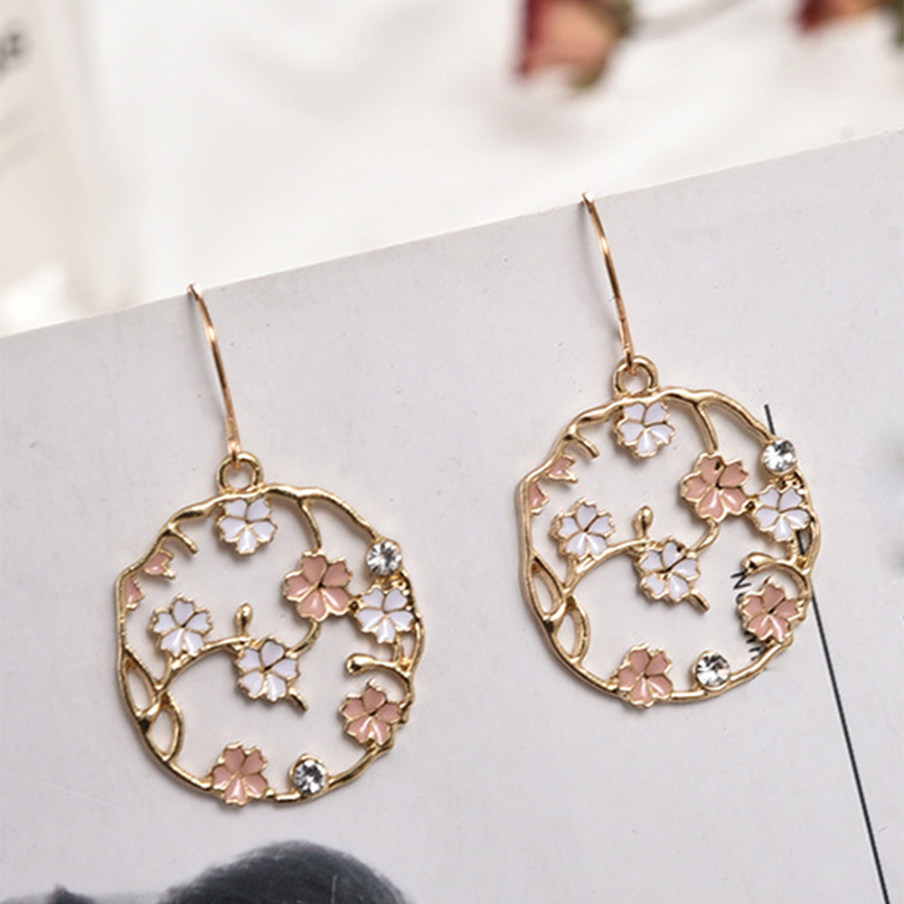 Fashion Creative Round Inlaid Flower Rhinestone Plum Alloy Earrings display picture 2