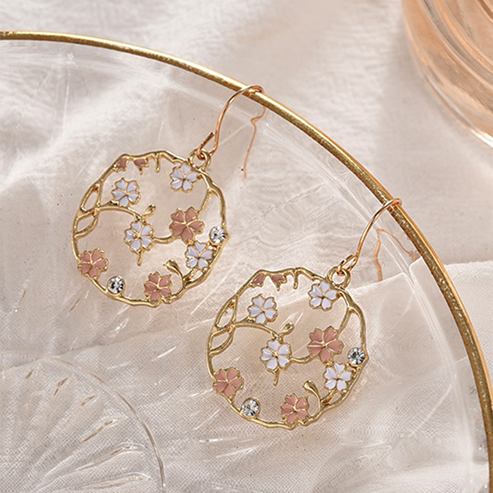 Fashion Creative Round Inlaid Flower Rhinestone Plum Alloy Earrings display picture 4