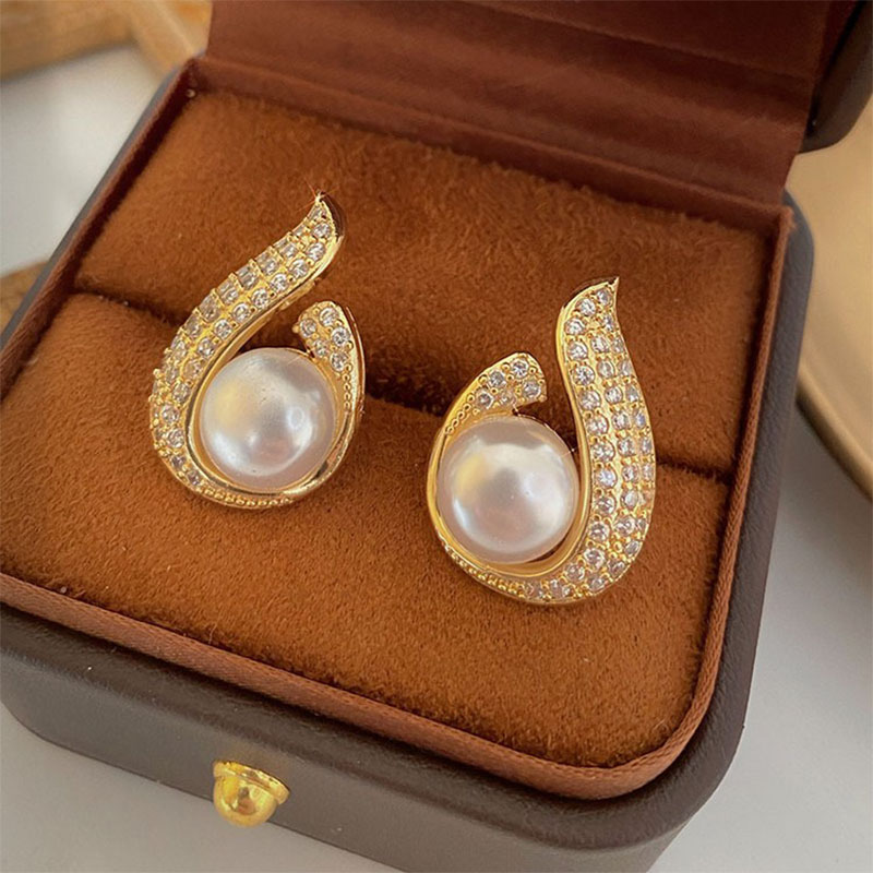 Women's Fashion Irregular Water Droplets Alloy Ear Studs Plating Inlay Artificial Pearl Rhinestone Stud Earrings display picture 3