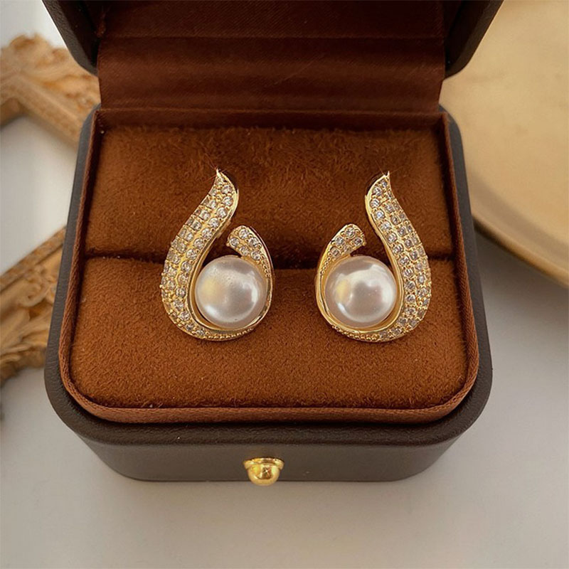 Women's Fashion Irregular Water Droplets Alloy Ear Studs Plating Inlay Artificial Pearl Rhinestone Stud Earrings display picture 4