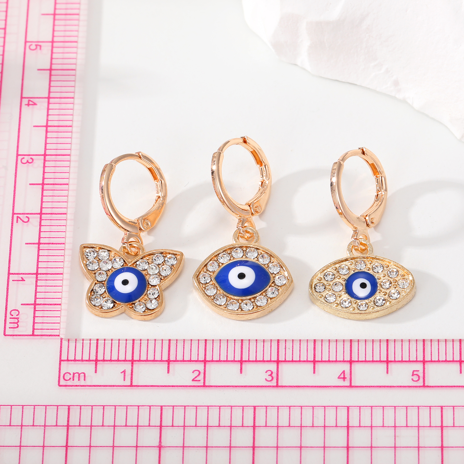 Wholesale Jewelry 1 Pair Retro Devil's Eye Butterfly Alloy Rhinestones Drop Earrings display picture 5