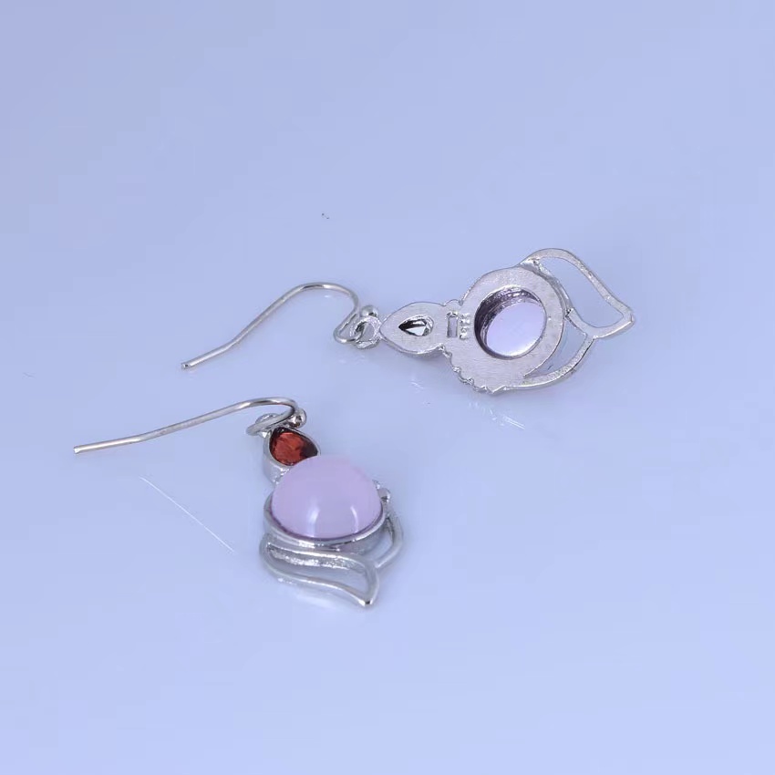 Retro Water Droplets Alloy Irregular Resin Dangling Earrings display picture 1