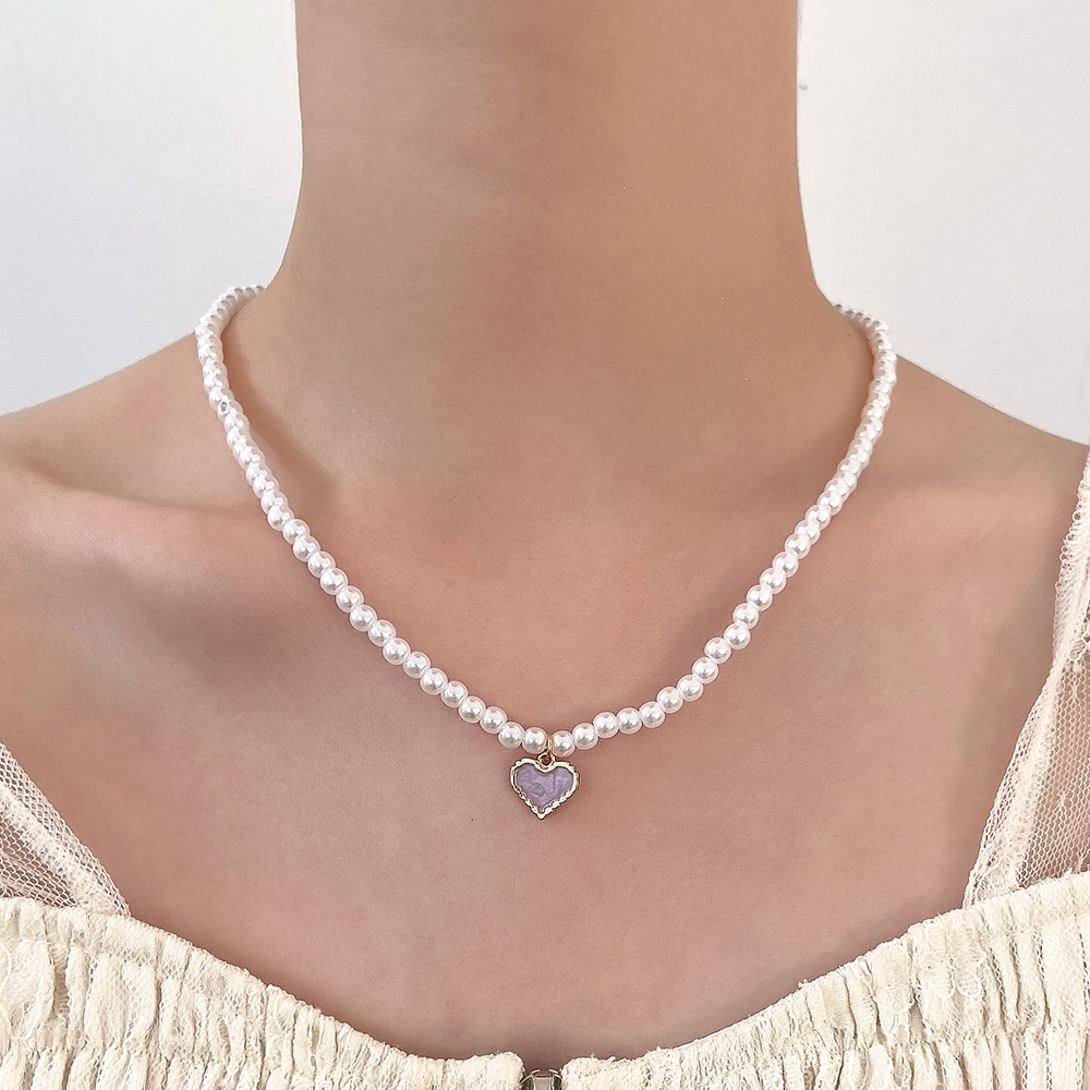 Fashion Heart Shape Imitation Pearl Enamel Pendant Necklace display picture 2
