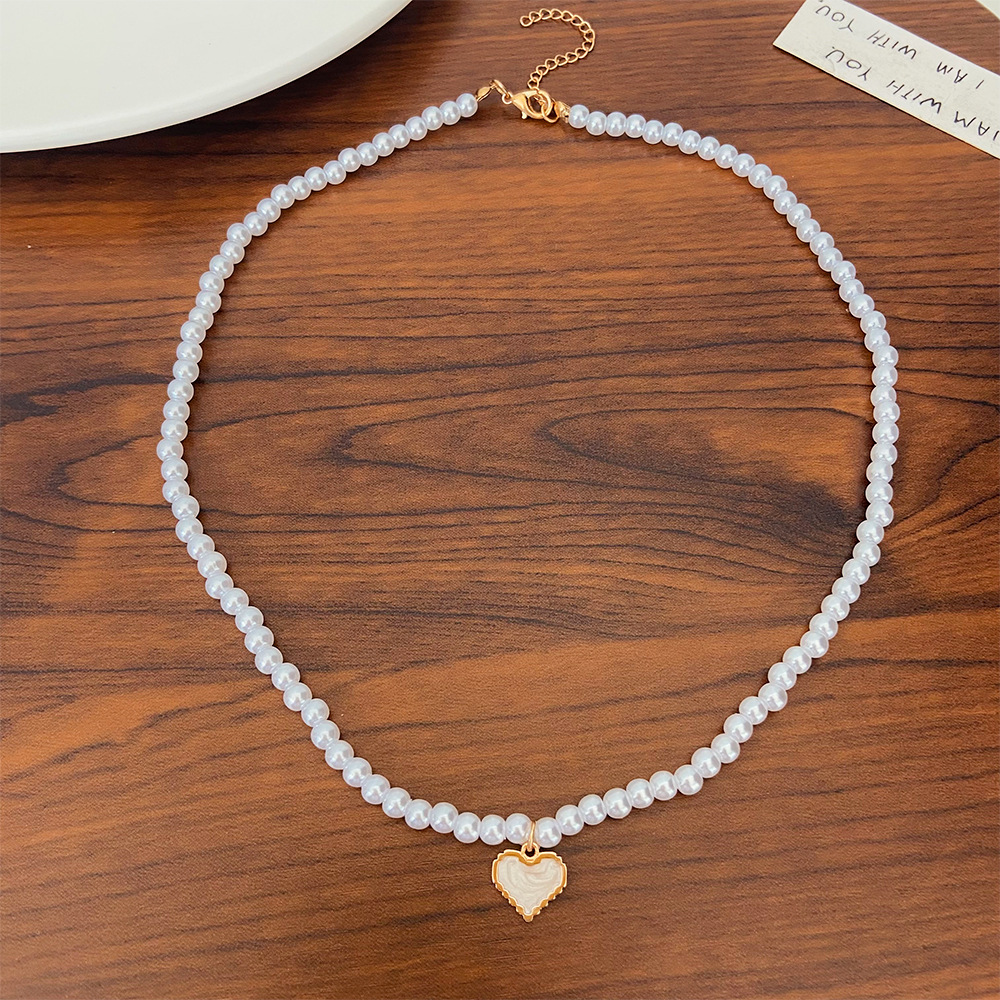 Fashion Heart Shape Imitation Pearl Enamel Pendant Necklace display picture 8