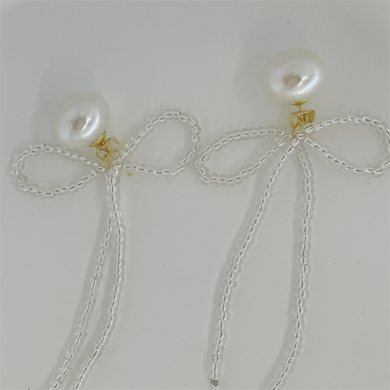 Classical Geometric Bow Knot Imitation Pearl Alloy Women's Drop Earrings 1 Pair display picture 2