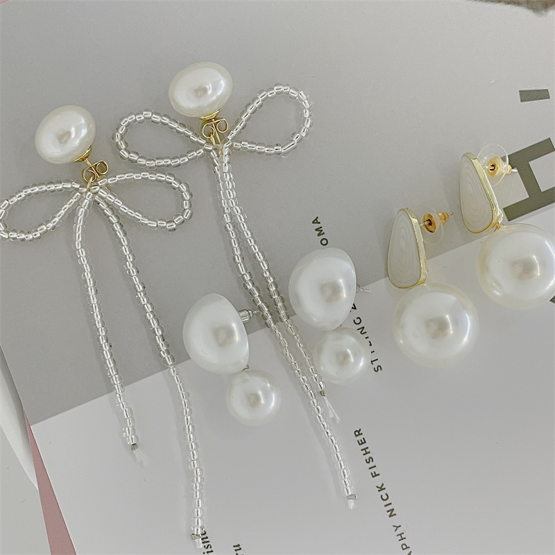 Classical Geometric Bow Knot Imitation Pearl Alloy Women's Drop Earrings 1 Pair display picture 5