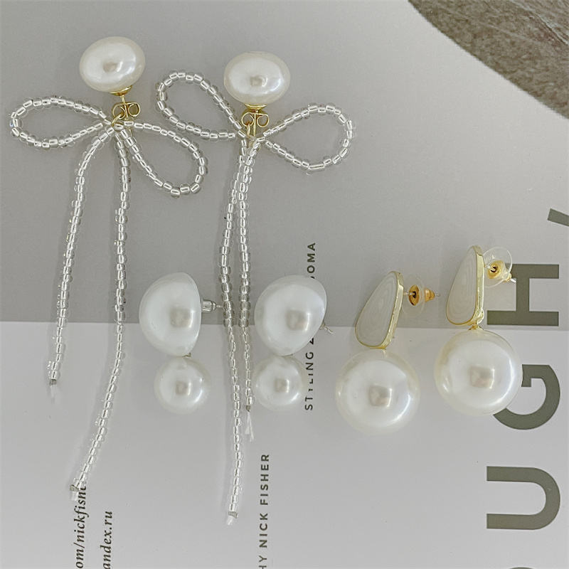 Classical Geometric Bow Knot Imitation Pearl Alloy Women's Drop Earrings 1 Pair display picture 4