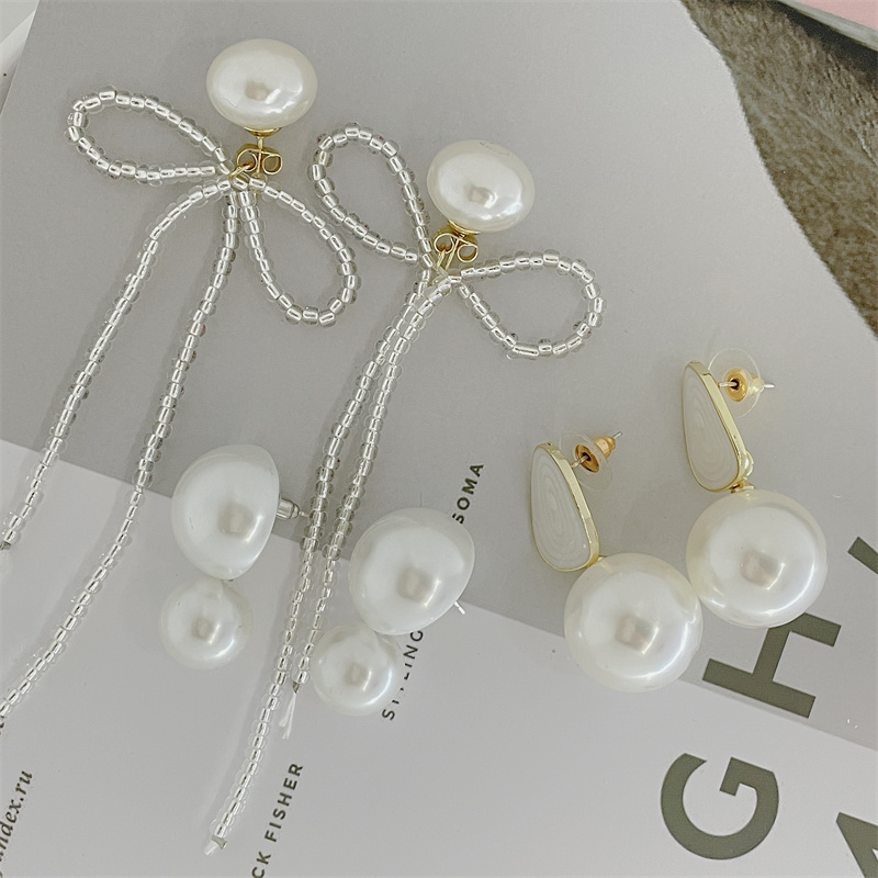 Classical Geometric Bow Knot Imitation Pearl Alloy Women's Drop Earrings 1 Pair display picture 8