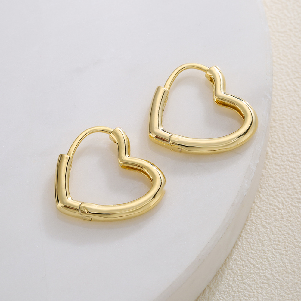 Mode Herzform Kupfer Vergoldet Aushöhlen Ohrringe 1 Paar display picture 2