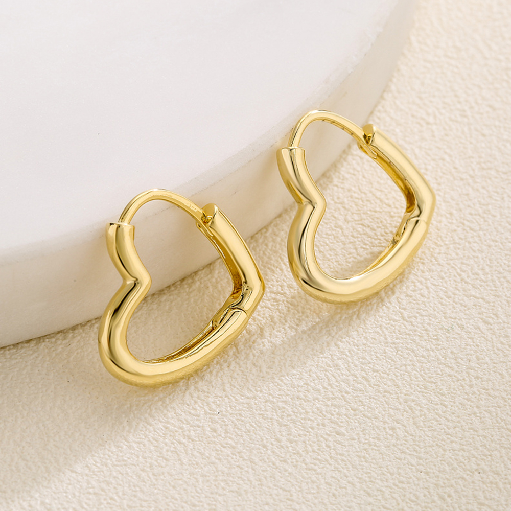 Mode Herzform Kupfer Vergoldet Aushöhlen Ohrringe 1 Paar display picture 3