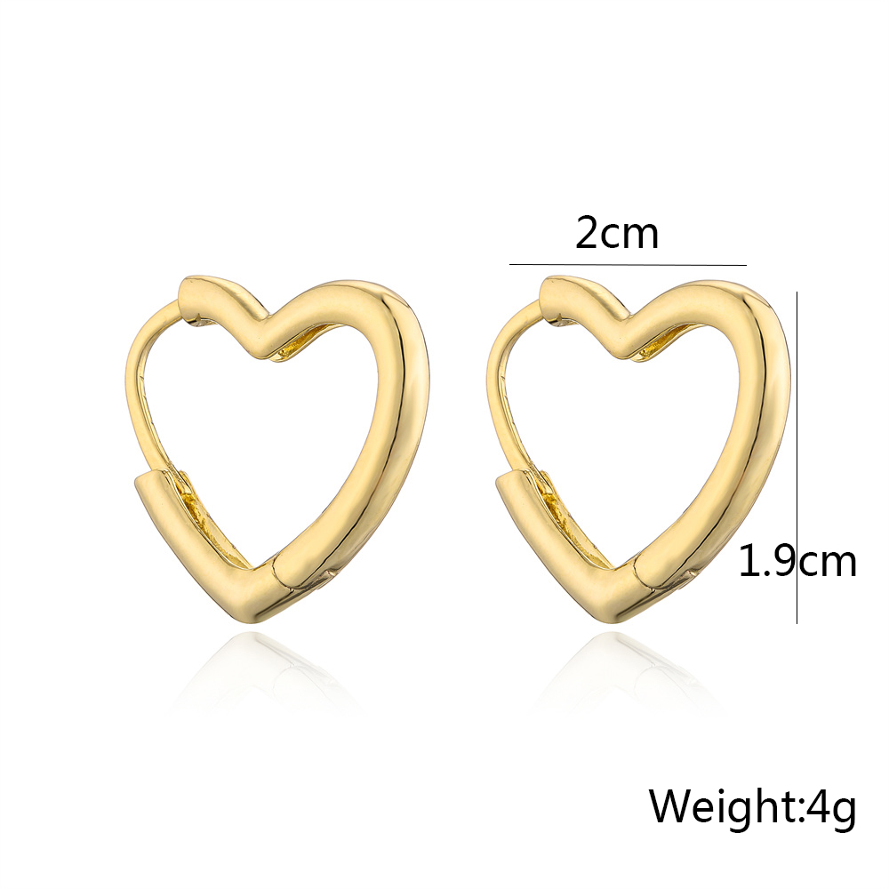 Mode Herzform Kupfer Vergoldet Aushöhlen Ohrringe 1 Paar display picture 4