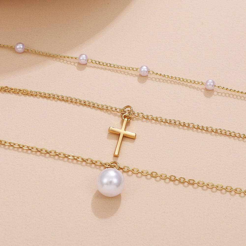 Retro Cross Palm Butterfly Alloy Inlay Artificial Pearls Rhinestones 14k Gold Plated Women's Layered Necklaces display picture 7