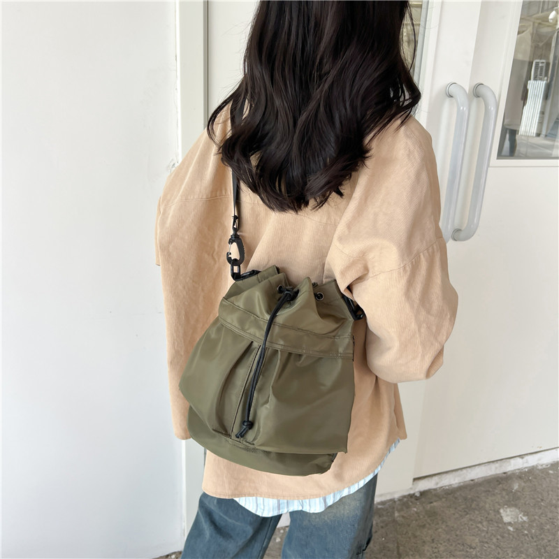 Women's Nylon Solid Color Preppy Style Classic Style Sports Cross Straps Sewing Thread Bucket String Crossbody Bag display picture 11