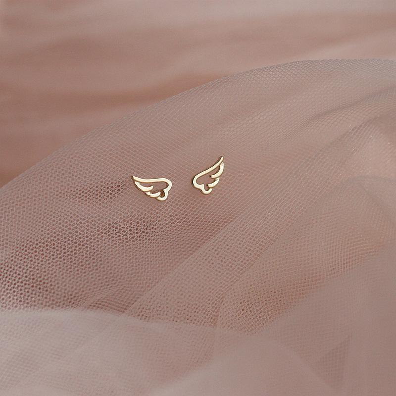 1 Pair Simple Style Commute Wings Hollow Out Alloy Copper Ear Studs display picture 2