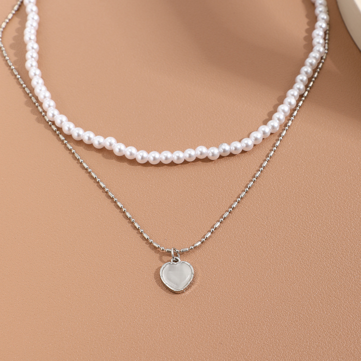Retro Heart Shape Imitation Pearl Alloy Plating Women's Layered Necklaces display picture 2