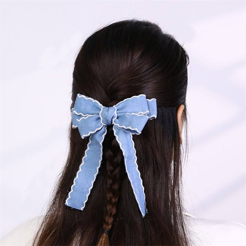Sweet Solid Color Bow Knot Cloth Hair Clip display picture 1