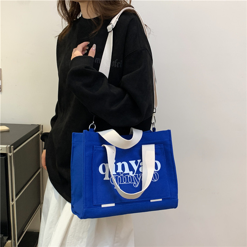 Women's All Seasons Canvas Letter Solid Color Preppy Style Classic Style Sewing Thread Square Hidden Buckle Shoulder Bag Canvas Bag Handbag display picture 2