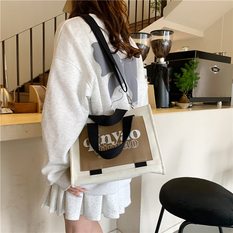 Women's All Seasons Canvas Letter Solid Color Preppy Style Classic Style Sewing Thread Square Hidden Buckle Shoulder Bag Canvas Bag Handbag display picture 3