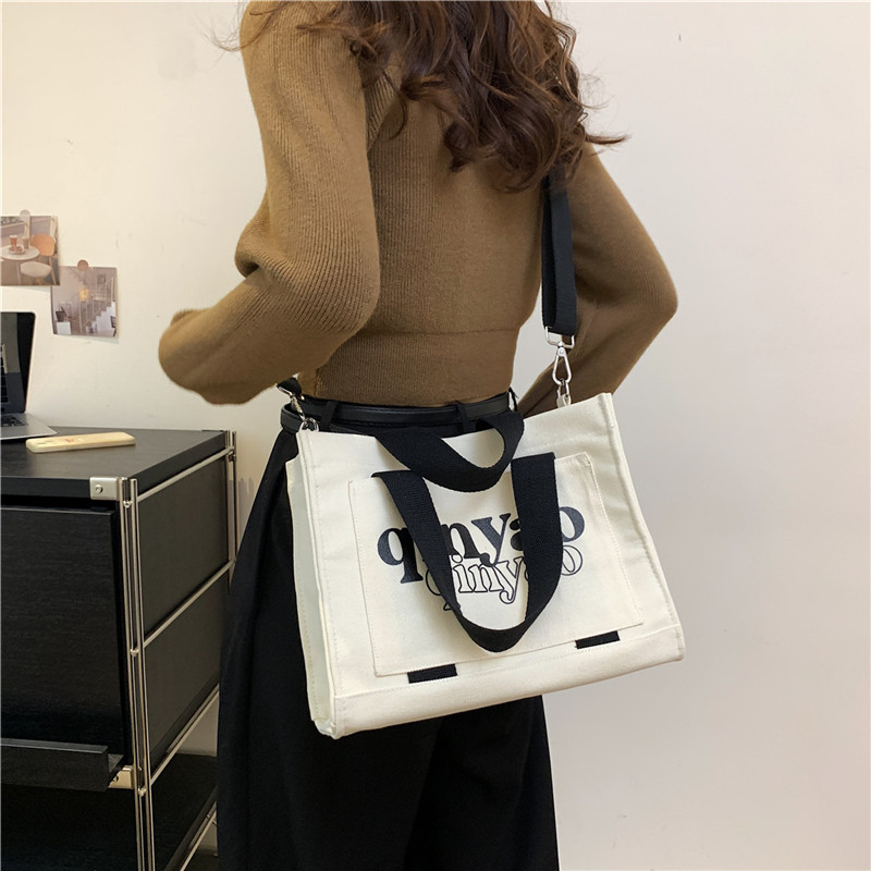 Women's All Seasons Canvas Letter Solid Color Preppy Style Classic Style Sewing Thread Square Hidden Buckle Shoulder Bag Canvas Bag Handbag display picture 10