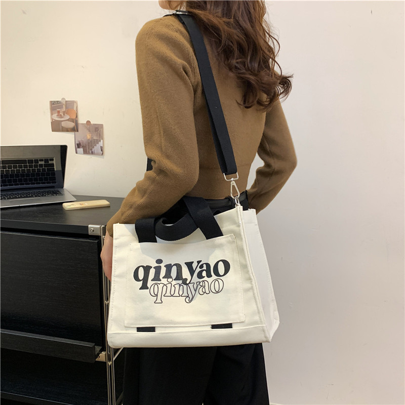 Women's All Seasons Canvas Letter Solid Color Preppy Style Classic Style Sewing Thread Square Hidden Buckle Shoulder Bag Canvas Bag Handbag display picture 6