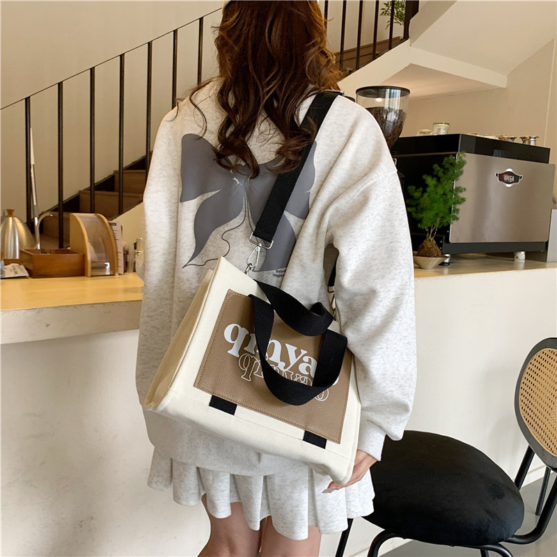 Women's All Seasons Canvas Letter Solid Color Preppy Style Classic Style Sewing Thread Square Hidden Buckle Shoulder Bag Canvas Bag Handbag display picture 11