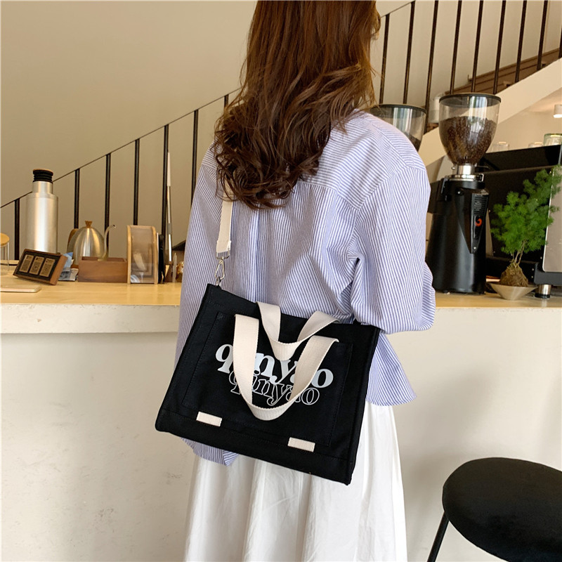 Women's All Seasons Canvas Letter Solid Color Preppy Style Classic Style Sewing Thread Square Hidden Buckle Shoulder Bag Canvas Bag Handbag display picture 15