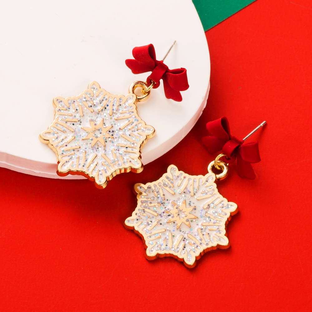 1 Pair Elegant Streetwear Bow Knot Snowflake Enamel Alloy Gold Plated Drop Earrings display picture 3