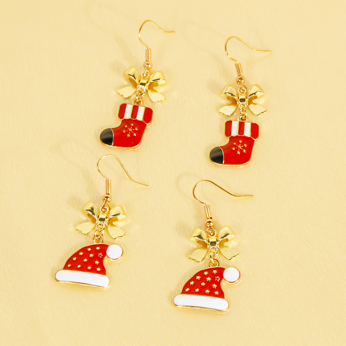 1 Pair Cute Sweet Commute Christmas Hat Christmas Socks Bow Knot Alloy Drop Earrings display picture 2