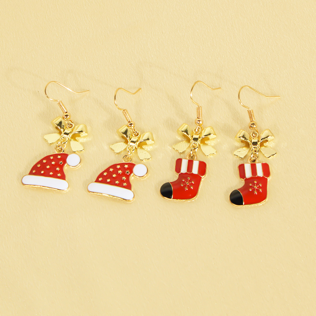 1 Pair Cute Sweet Commute Christmas Hat Christmas Socks Bow Knot Alloy Drop Earrings display picture 3