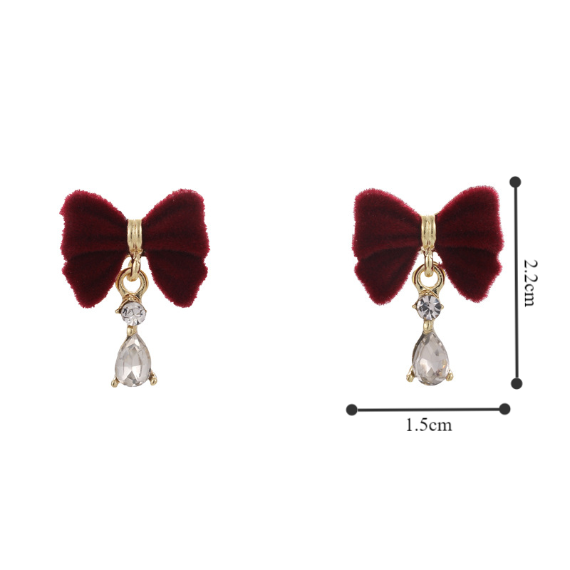 1 Pair Vintage Style Bow Knot Plating Alloy Flocking Gold Plated Drop Earrings display picture 1
