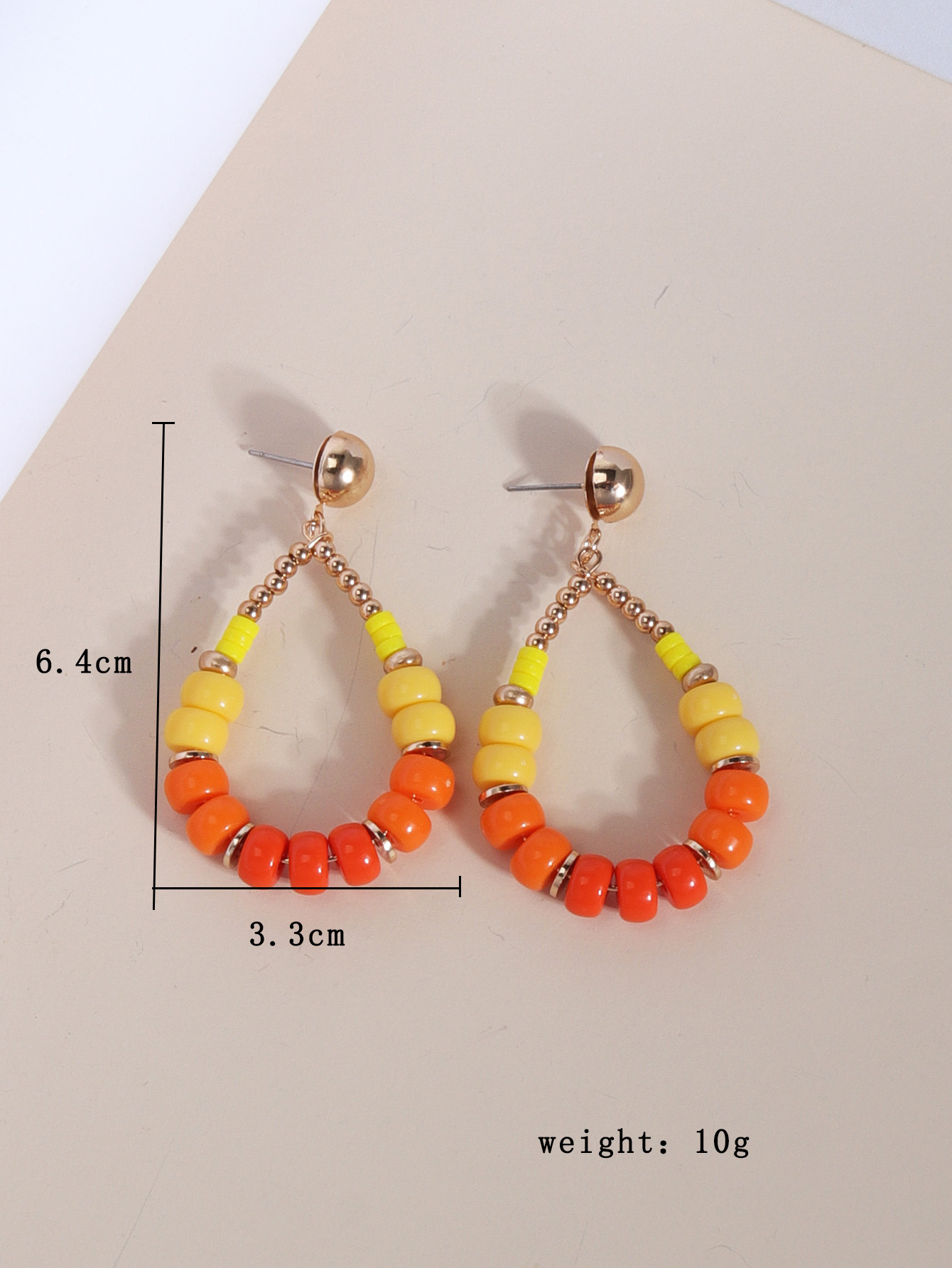 1 Pair Ethnic Style Streetwear Water Droplets Plating Beaded Synthetic Resin Shell 18k Gold Plated Drop Earrings display picture 1