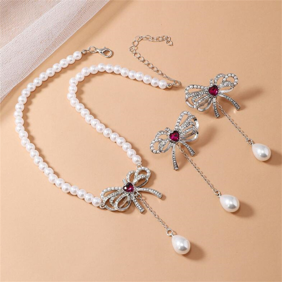 Elegant Bow Knot Imitation Pearl Alloy Inlay Rhinestones Women's Earrings Necklace display picture 2