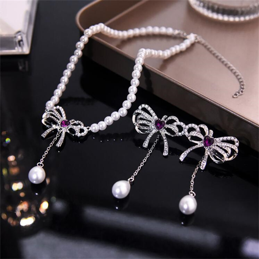 Elegant Bow Knot Imitation Pearl Alloy Inlay Rhinestones Women's Earrings Necklace display picture 3