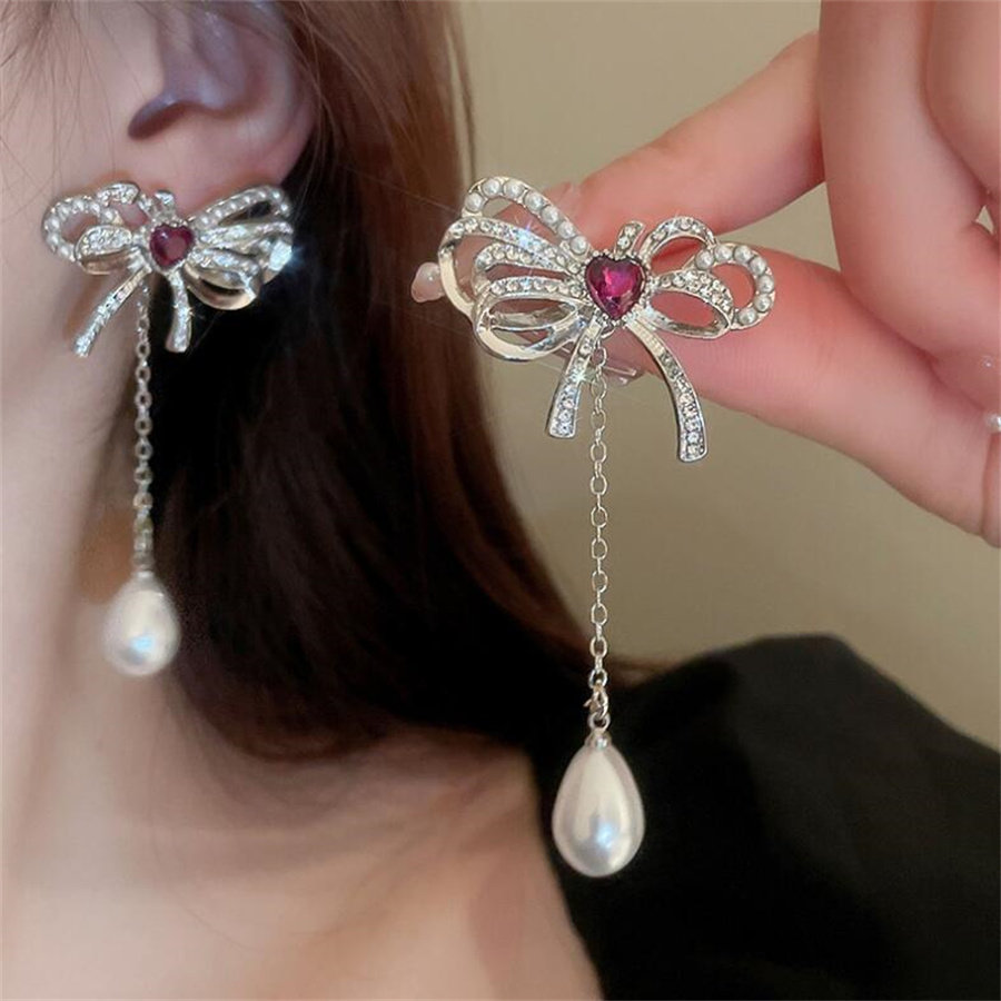Elegant Bow Knot Imitation Pearl Alloy Inlay Rhinestones Women's Earrings Necklace display picture 7