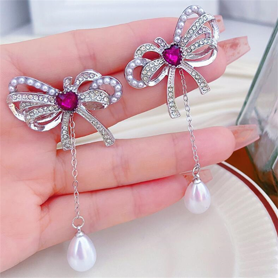 Elegant Bow Knot Imitation Pearl Alloy Inlay Rhinestones Women's Earrings Necklace display picture 8