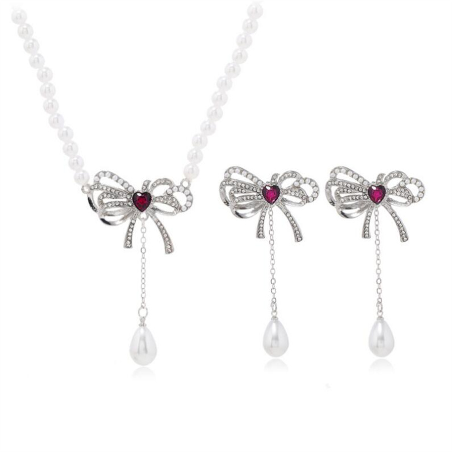 Elegant Bow Knot Imitation Pearl Alloy Inlay Rhinestones Women's Earrings Necklace display picture 4