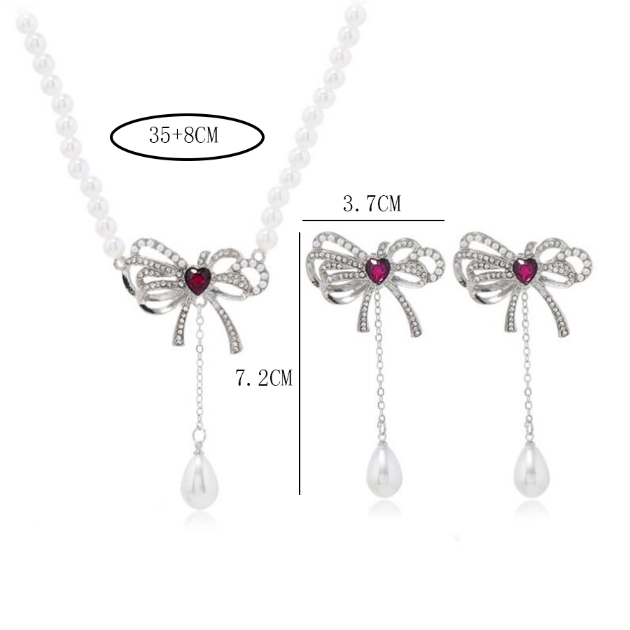 Elegant Bow Knot Imitation Pearl Alloy Inlay Rhinestones Women's Earrings Necklace display picture 5