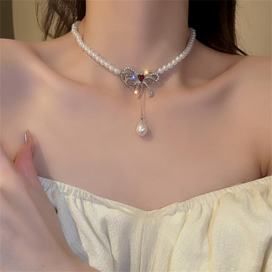 Elegante Nudo De Lazo Perla De Imitación Aleación Embutido Diamantes De Imitación Mujeres Aretes Collar display picture 6