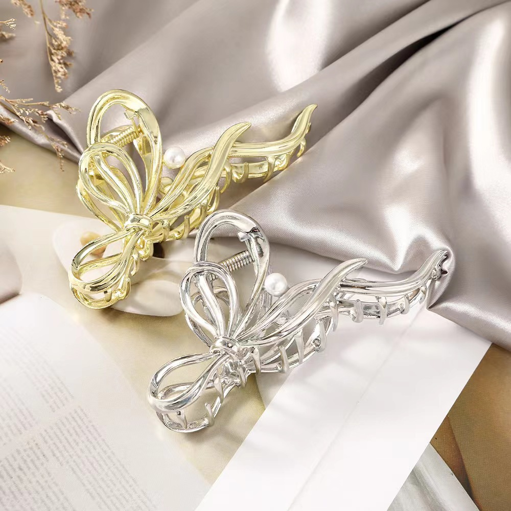 Elegant Lady Simple Style Bow Knot Imitation Pearl Alloy Plastic Three-dimensional Hair Claws display picture 11