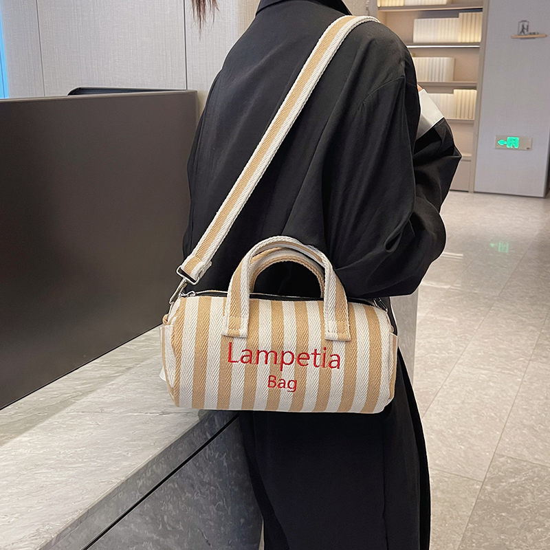 Women's Canvas Stripe Classic Style Sewing Thread Cylindrical Zipper Shoulder Bag Handbag Crossbody Bag display picture 1