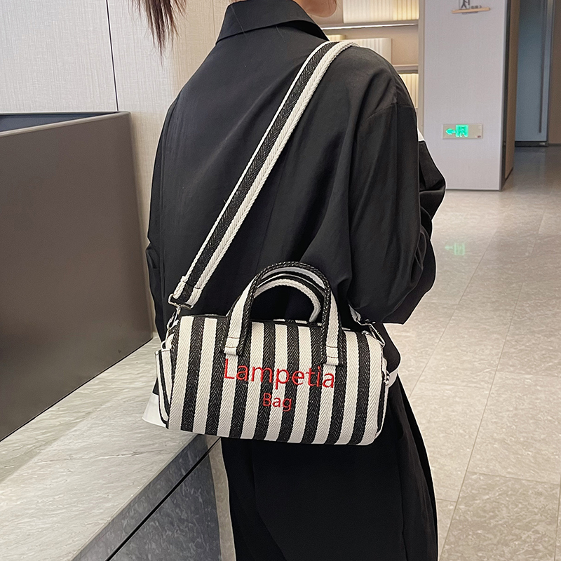 Women's Canvas Stripe Classic Style Sewing Thread Cylindrical Zipper Shoulder Bag Handbag Crossbody Bag display picture 8