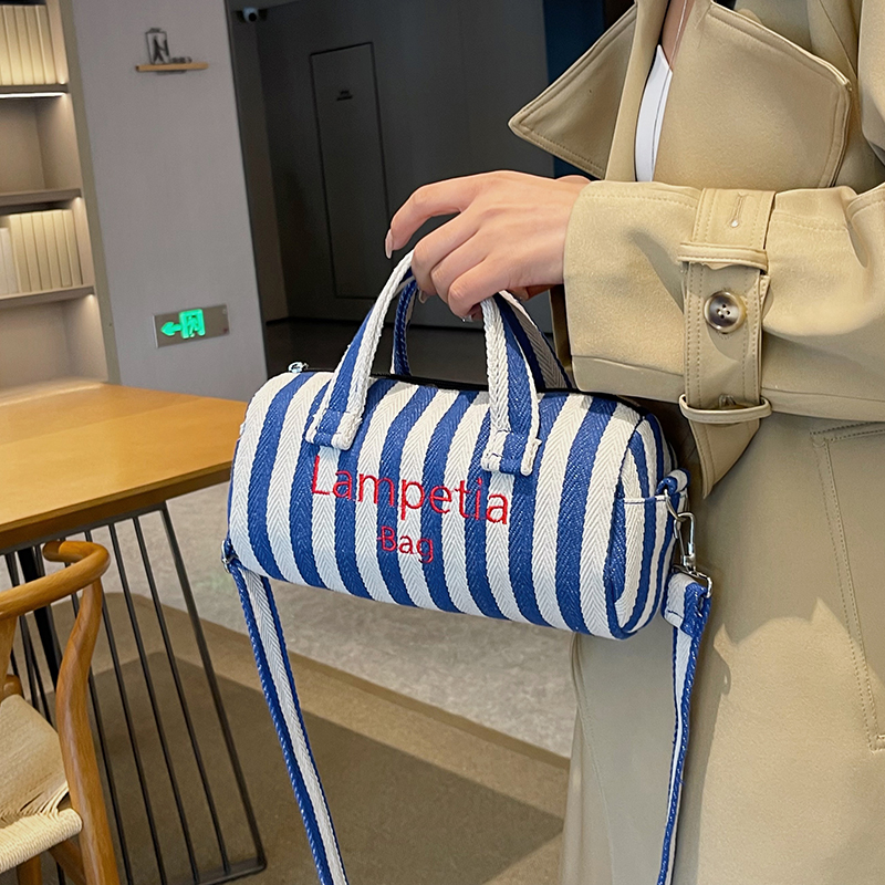 Women's Canvas Stripe Classic Style Sewing Thread Cylindrical Zipper Shoulder Bag Handbag Crossbody Bag display picture 13