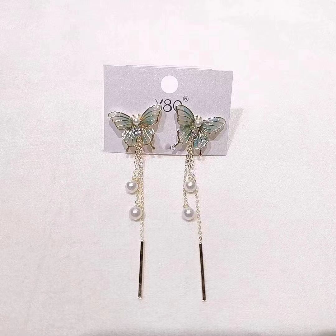 1 Paar Elegant Dame Bogenknoten Überzug Imitationsperle Legierung Tropfenohrringe display picture 5
