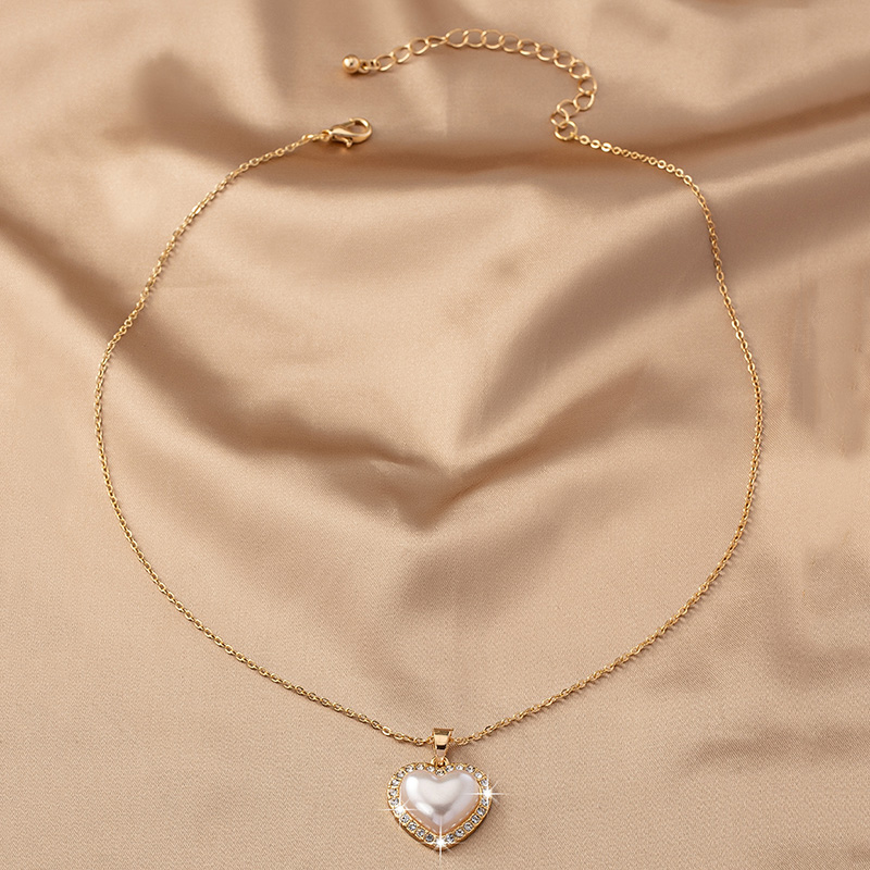 Dulce Estilo Coreano Electrocardiograma Forma De Corazón Alas Diamantes De Imitación Perla Aleación Venta Al Por Mayor Collar Colgante display picture 2