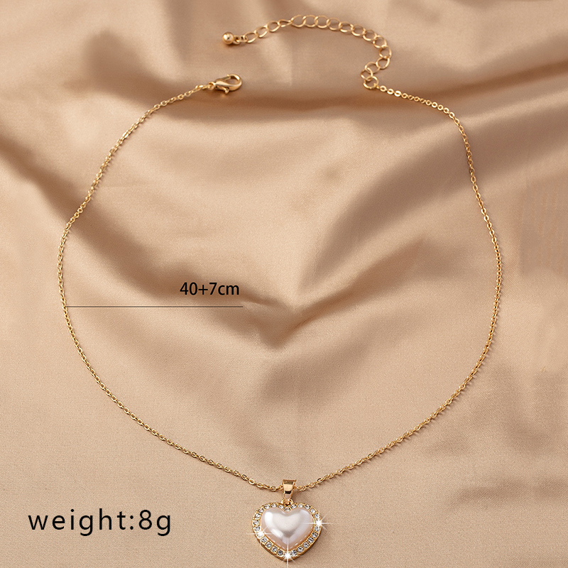 Sweet Korean Style Electrocardiogram Heart Shape Wings Rhinestones Pearl Alloy Wholesale Pendant Necklace display picture 3