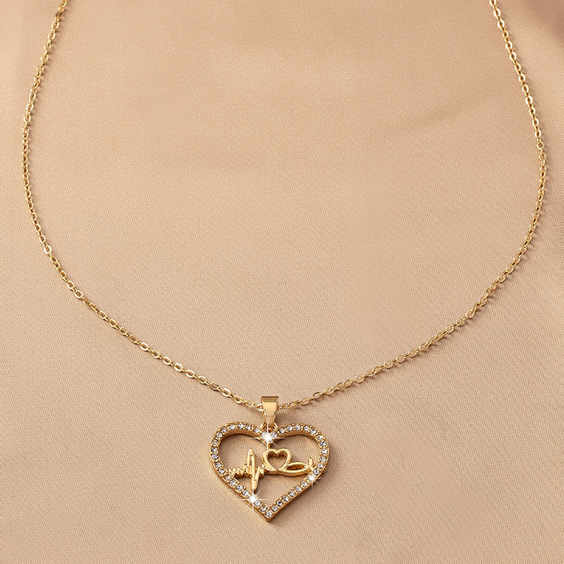 Dulce Estilo Coreano Electrocardiograma Forma De Corazón Alas Diamantes De Imitación Perla Aleación Venta Al Por Mayor Collar Colgante display picture 15