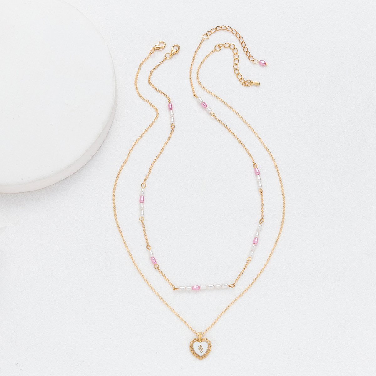 Elegant Heart Shape Alloy Plastic Women's Layered Necklaces display picture 2