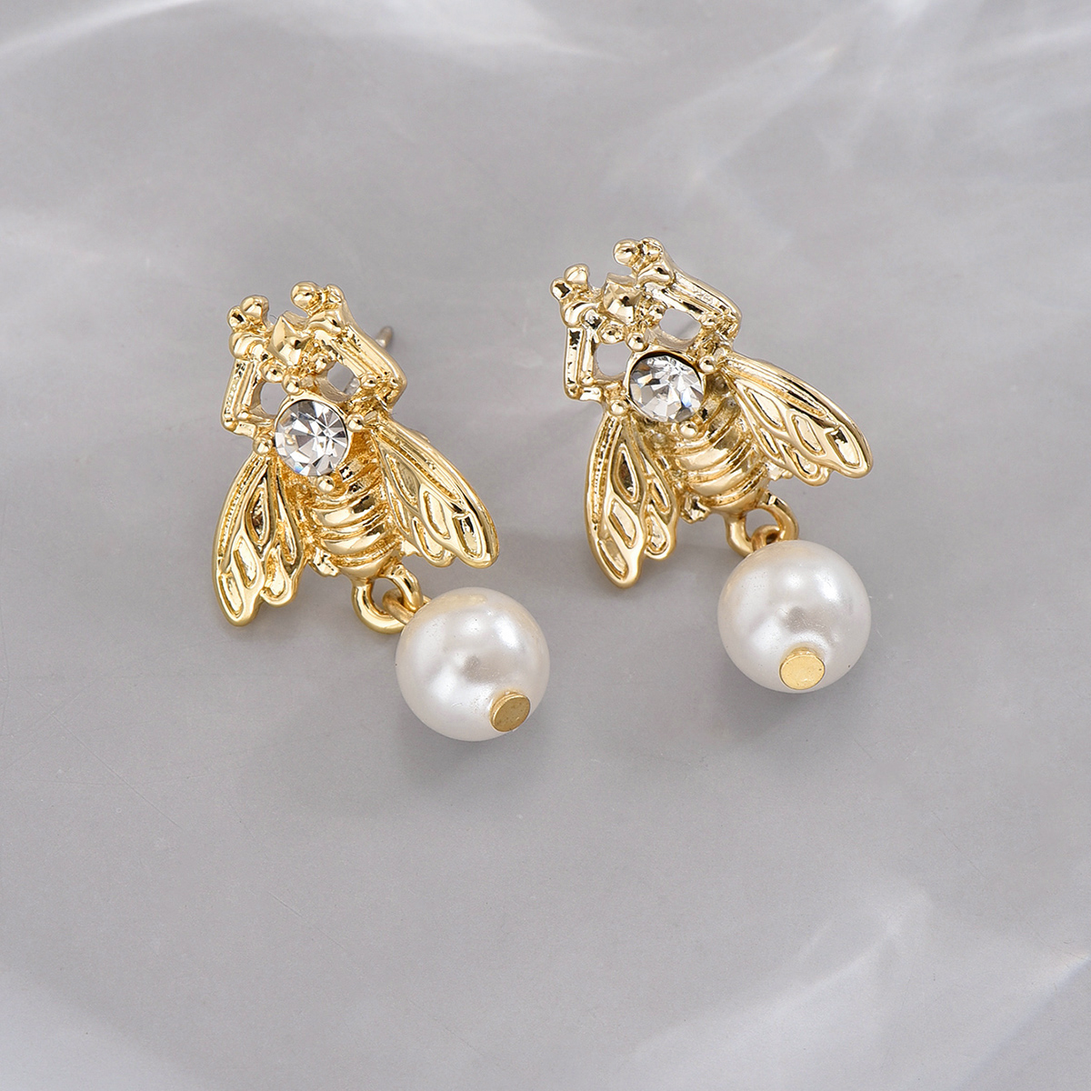 1 Pair Simple Style Insect Bow Knot Pearl Inlay Alloy Zinc Rhinestones Drop Earrings Ear Studs display picture 1