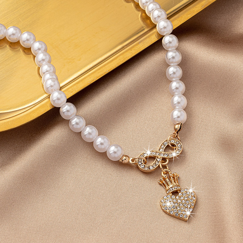 Elegante Dulce Forma De Corazón Aleación Enchapado Embutido Diamantes De Imitación Perla Mujeres Collar Colgante display picture 3