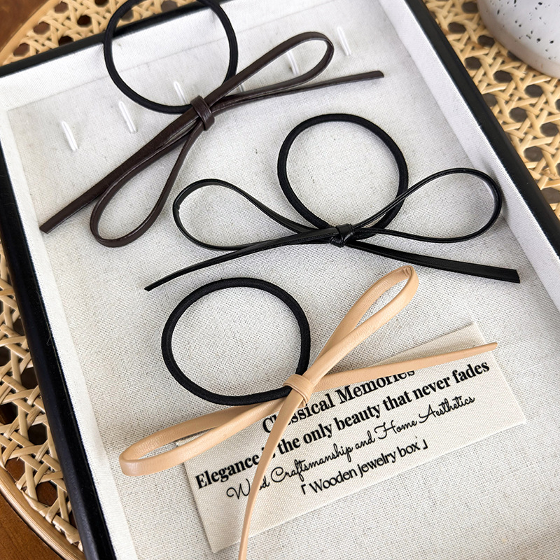 Women's Simple Style Commute Bow Knot Pu Leather Hair Tie display picture 1
